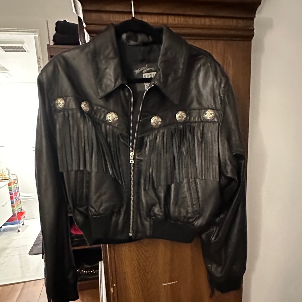 MICHAEL HOBAN NORTH BEACH LEATHER FRINGED LAMBSKIN BOMBER JACKET W CONCHOS.